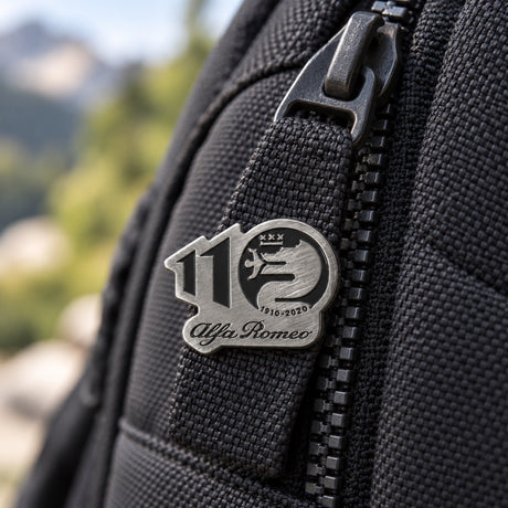 Alfa Romeo 110th Anniversary Metal Badge – Black – illustrative photo (AI)
