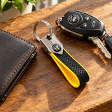 Alfa Romeo BAND Schlüsselanhänger – Carbon Yellow – Illustrationsfoto (KI)