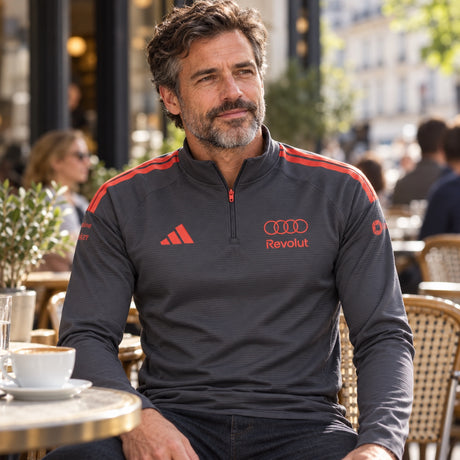 Audi Revolut F1 x Adidas Trainingsoberteil mit Sponsorenlogos – Grau – Illustrationsfoto (KI)