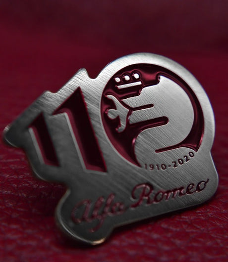 Alfa Romeo 110th anniversary metal badge red